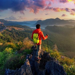 backpacker-standing-sunrise-viewpoint-ja-bo-village-mae-hong-son-province-thailand_335224-1356