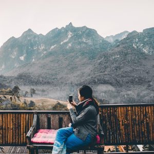 rear-view-man-looking-mountains_1048944-26658709